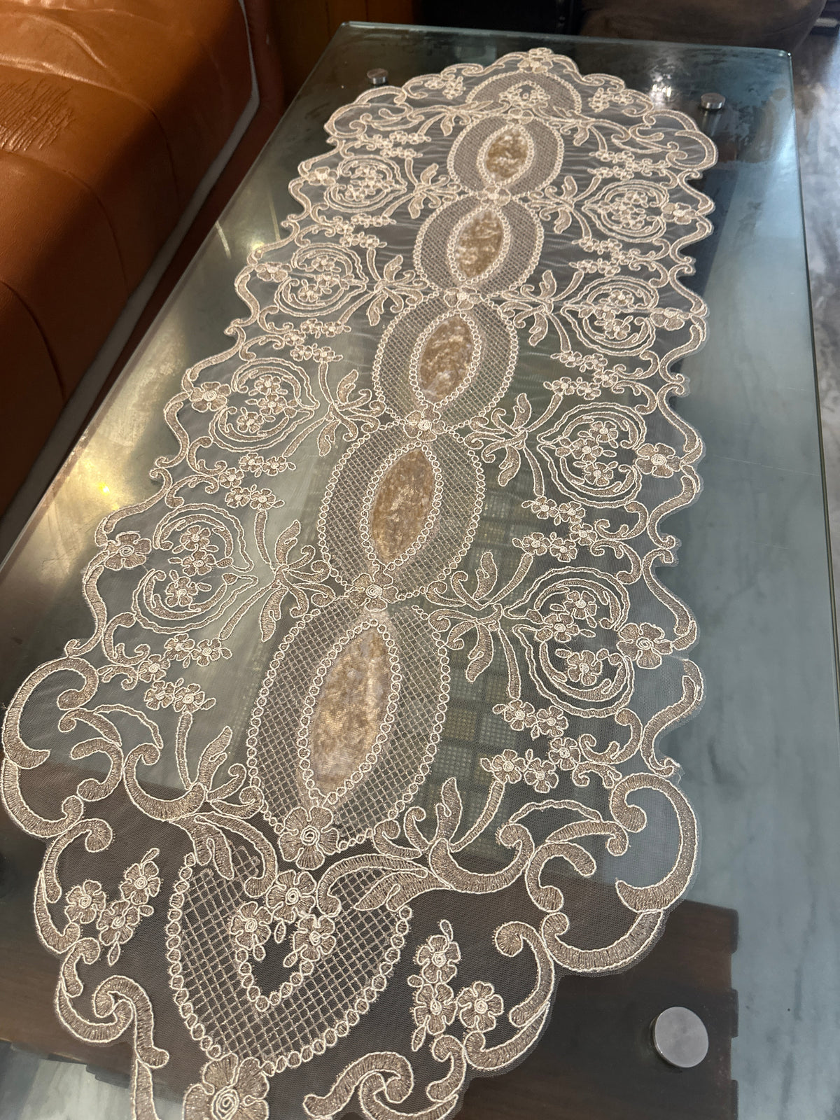 Close-up of intricate embroidery on the premium table runner