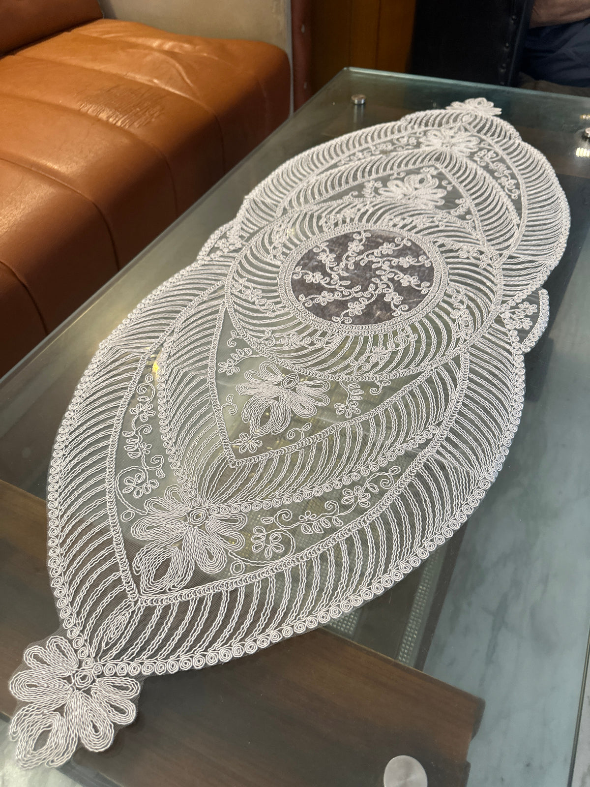 1. Close-up of the premium grey lace-style table runner