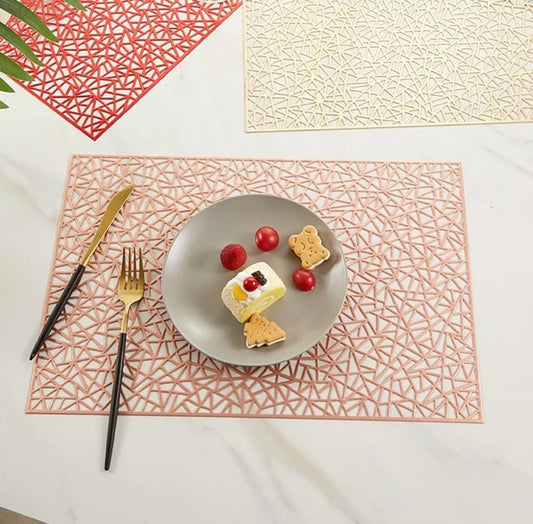 Rectangular metallic placemat with geometric pyramid pattern