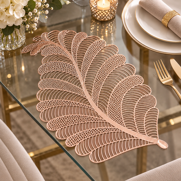 Rose gold metallic table mat with swirl leaf design